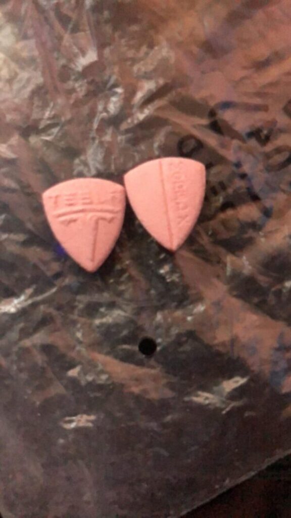 Home 21 Buy Pink Tesla Model 275mg MDMA Pills